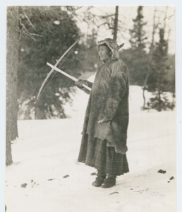 Image of Nascopie Indian [Innu] woman with bow and arrow